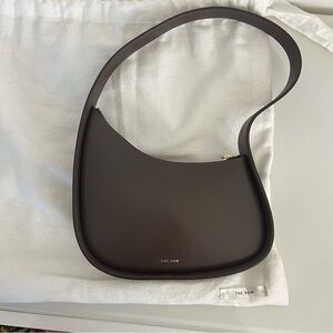 The Row Half Moon Smooth Calfskin in Dark Brown